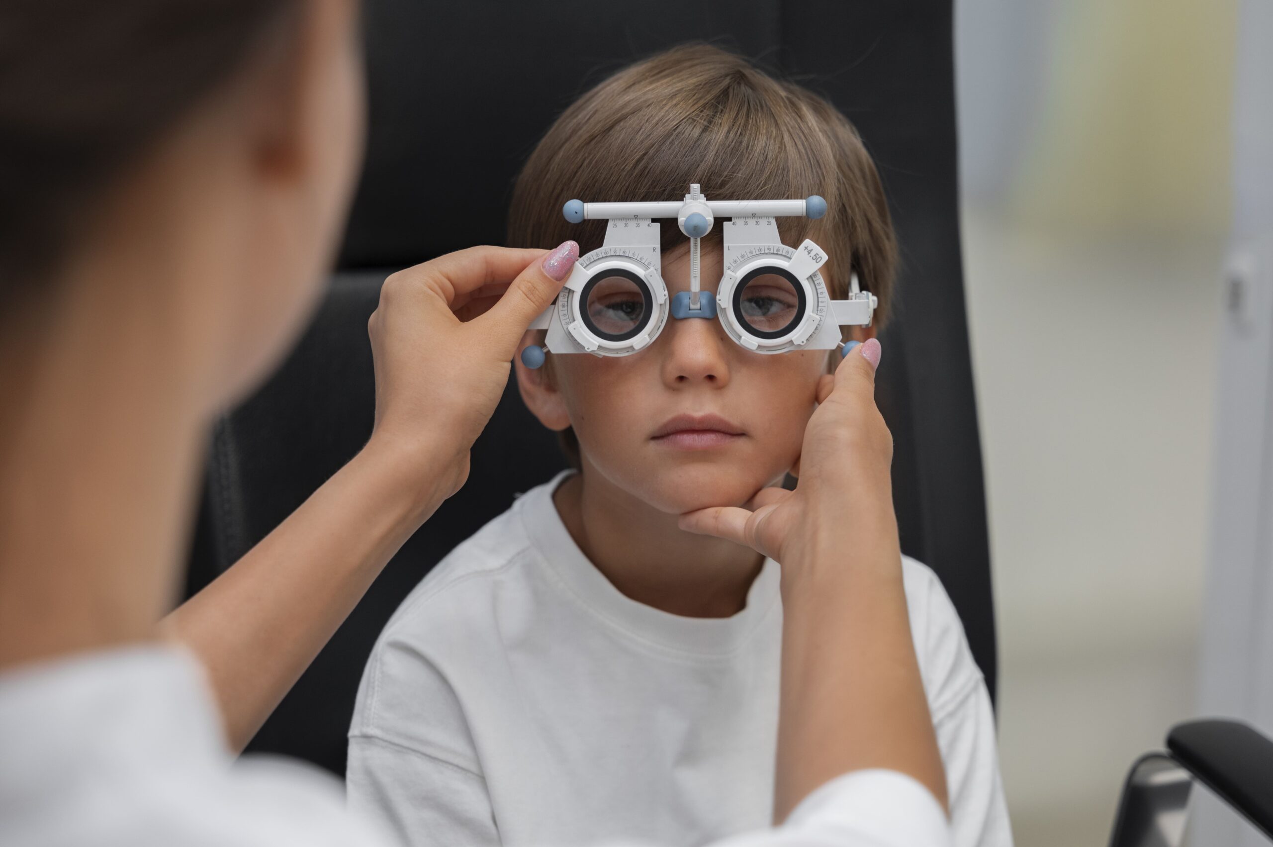 Front view boy eye checkup